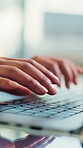 Hands, laptop and typing in office for business, email response or research for company development. Person, employee and keyboard in workplace for message draft, connectivity and closeup with tech