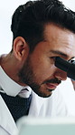 Microscope, science or man with tablet in lab, clinical pathology or study virus sample for cure. Medical research, biotech or scientist with investigation for pharma, experiment report or smile