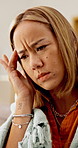 Woman, headache and sick with blanket in home for rest, recovery and frustrated with temple massage. Asian person, migraine and fatigue with chronic pain, vertigo and tired with virus at apartment