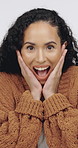 Excited, winning and face of woman in studio for bonus, discount or victory in competition. Happy, surprise and portrait of female person with wow reaction on achievement giveaway by white background