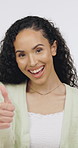 Face, vote and woman with thumb up in studio, agreement or positive opinion for university education. White background, promotion and person with acceptance sign, laughing and yes gesture for college
