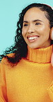 Happy, dance and woman with headphones in studio for online streaming, music app and subscription. Dancer, energy and person listening to audio, radio and playlist for good mood on blue background