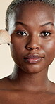 Face, makeup brush and blush with black woman in studio for self care, glow and foundation. Cosmetics, highlighter shine and cosmetology with person on white background for eyeshadow and beauty