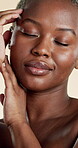 Beauty, smile and hands with black woman in studio for skincare, hydration and glow. Shine, aesthetic and dermatology with female person on white background for hygiene, clear skin and self care
