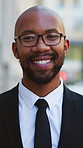 Happy, outdoor and face of black man in city with confidence for finance career growth. Smile, professional and portrait of male financial manager with pride for corporate job opportunity in town.