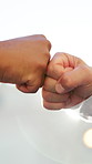 People, hands and greeting with fist bump for celebration, thank you or good job on mockup space. Closeup, friends or meeting with touch, sunshine or lens flare for teamwork, motivation or winning