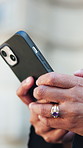 Phone, typing and hands of business woman in city for contact, networking and update for legal trial. Attorney, government and person on cellphone for connection, message and research for litigation