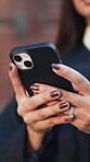 Phone, lawyer and hands of woman in city for typing message, networking and update for legal trial. Attorney, online and person on cellphone for connection, feedback and advice for court case in town