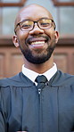 Happy, lawyer and face of black man in city with pride for legal career, justice and government. Crossed arms, attorney and portrait of person by courthouse for trial, legislation and constitution 
