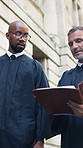 Lawyer, discussion and men in city, documents and advice for compliance review. Judge, outdoor and people in street, legal case planning and criminal investigation with teamwork, portfolio or talking