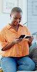 Happy, black woman and phone with credit card at house for ecommerce, fintech and transaction. Smile, person and mobile for online shopping, easy payment and bank information of purchase subscription