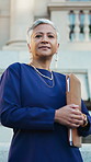 Lawyer, thinking and face with business woman in city for legal aid, reflection and attorney pride. Vision, courthouse advisory and justice with mature person outdoor for trial and consultant