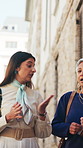 Walking, discussion and women in city for meeting, feedback and planning on morning commute. Professional, trip and worker with assistant for conversation on travel, chat and journey with advice