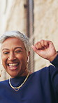 Smile, dancing and mature businesswoman in city with good news, achievement or finance project approval. Earphones, energy and female financial manager with groove for job promotion in urban town.