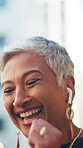 Business, woman and dance with earphones outdoor for travel, streaming podcast and good news. Excited, mature person and energy with rhythm, listening to music and celebration for morning commute