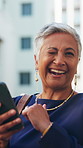 Face, business and woman with wink, phone for connection and success for profit growth. Mature person, outdoor and happy employee in city, online chatting or reaction for bonus, excited and promotion