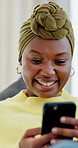 Laugh, message and black woman on sofa with phone, online connection and meme post on social media.  Happiness, digital and person in house with tech, funny text or gif reaction on chat app.
