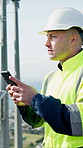 Phone, man and technician by solar panels outdoor with texting, email or online feedback for repairs. Technology, typing and male electrician with cellphone for review on mobile app for installation.