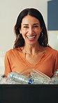 Happy woman, plastic bottle and face for recycling with cleaning, bin or stop pollution in house. Mature person, sort garbage and container for portrait, sustainability or accountability in Spain