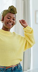 Headphones, dancing and black woman in home on break for streaming, audio and playlist for WFH. Remote work, phone and happy person with movement listening to music, radio and track for good mood