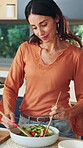 Cooking, woman and salad meal prep in kitchen for healthy recipe, vegetarian diet and nutrition. Food, happy mature person or fresh ingredients in home for lunch process, vegan dish or organic brunch