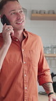 Happy man, chat and phone call on break in kitchen, home and communication with contact and talking. Laughing, person and gossip with mobile on weekend, humor and funny conversation with technology