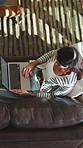 Reading, sofa and above of woman on laptop for remote work with draft, submission and proofreading. Book editor, home and person on computer with publication for online editing, review and feedback