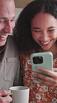 Coffee, laughing and couple with phone in kitchen for online meme, conversation and bonding in morning. Happy, home and happy man with woman on cellphone for social media, internet post and humor