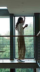 Happy, dance and woman with drink in home for inspiration, good mood and positive attitude in morning. Balcony, house and person with beverage for calm, peace or wellness with me time, break or music
