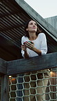 Morning, balcony and woman with drink outdoor for fresh air, reflection or perspective to start day. Home, relax and person with beverage for calm, peace and breathe for rest, wellness or inspiration
