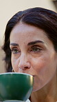 Relax, coffee and thinking with woman in home for reflection, peace and perspective. Vision, calm and memory with mature person and cup in apartment for wellness, drinking and morning inspiration