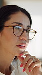 Businesswoman, thinking and project with glasses in office, publisher or planning for book marketing. Creative, online and mature person with publishing decision, serious and reflection on ad budget
