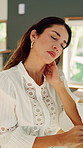 Tired, stress and woman with neck pain in office for pressure, strain and burnout for deadline. Creative, workplace and person with fatigue, exhausted and injury for overworked with online project