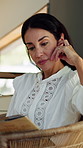 Woman, reading book and relax in home with story, literature and poetry for language in living room. Mature person, information and knowledge with novel, fiction and learning in lounge at apartment