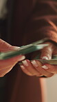Counting, bills and payment with cash and hands for money laundering, crime and bribery payout. Interest rate, corruption and cashback fraud with person for profit, settlement deal and notes
