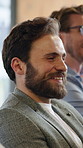 Business, applause and man with smile, celebration for profit increase and support for stock market. Happy person, audience and employee in seminar, clapping for achievement or success with growth