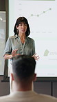 Woman, presentation and crowd at convention with discussion, graphs and screen for market share growth. Person, speaker and whiteboard with insight, explain and charts with seminar at finance agency