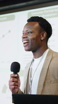 Black man, speaker and podium with microphone for presentation, company speech or tradeshow. Businessman, conference and projector with mic for corporate workshop, staff training or work seminar