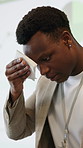 Speaker, man and nervous with sweating in seminar for speech, notes preparation or pressure. Summit event, black person or stress at keynote address for public speaking, presentation or worry in hall