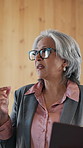 Business, woman and talking at conference event for networking, interaction and finance upskill. Mature person, discussion or corporate seminar for financial venture, talent acquisition and tradeshow