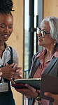 Conference, networking and people on break with tablet, discussion or business advice at workshop. Collaboration, meeting or employees with tech, b2b opportunity or guidance at corporate seminar.