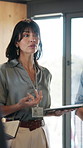 Businesswoman, advice and networking at convention center with tablet, seminar agenda or trade show. Mature person, event organizer and tech at conference with explain expo, schedule or workshop tips