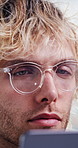 Business, man and reading with laptop in office for research, finance report and investigation. Person, glasses and pc reflection for financial assessment, risk management and compliance information