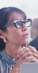 Fashion, thinking or woman in office with laptop, research or clothing insight in creative process. Reflection, glasses or mature designer with tech, style development or trend ideas for catalog.