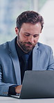 Reading, business and man with laptop in office, check report and investment proposal for approval. Smile, computer or manager with funding sanction for trading project, research or asset management