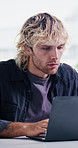 Planning, reading and man with laptop in office, marketing proposal and campaign development report. Review, typing and employee with advertising idea for brand awareness, computer or creative agency