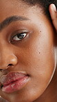 Serious, skincare and face of black woman in studio for self care, aesthetic or glow. Beauty, dermatology or collagen rejuvenation with person on white background for shine, smooth skin and hydration