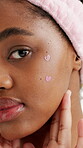 Skincare, face and girl with acne patches for healing benefits, skin protection and wellness. Beauty, black person and heart stickers on studio background for pimple treatment, self care or cosmetics