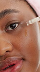Beauty, skincare and face of girl with serum for hydration, hyaluronic acid and wellness benefits. Dropper, black person and apply retinol product on closeup for skin elasticity, vitamin c or routine