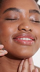 Happy, beauty and girl with skincare in studio for healthy skin, natural glow and makeup. Cosmetics, black person and smile on white background for collagen treatment results, radiance and self care